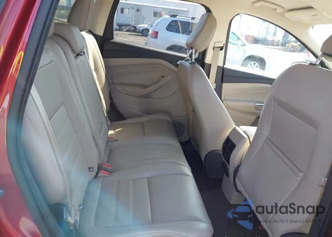 2018 Ford Escape Titanium z USA, uszkodzony, nr VIN 1FMCU0J9XJUB67342